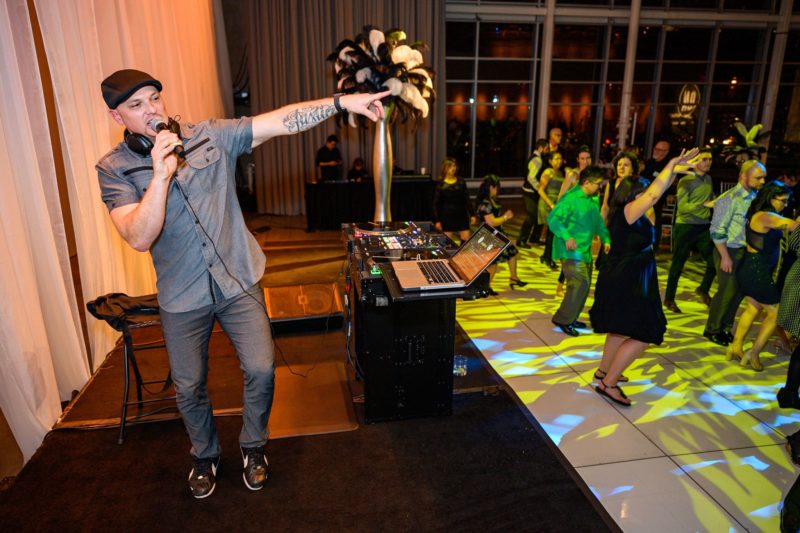 DJ pointing to people on the dance floor DJ pointing to people on the dance floor