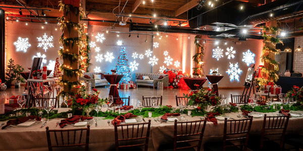 Elderwise Christmas 2022 a room with a decorated table and chairs